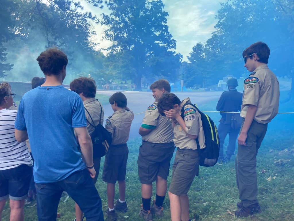 D-Day 2024 - Scouts covering their faces from the smoke